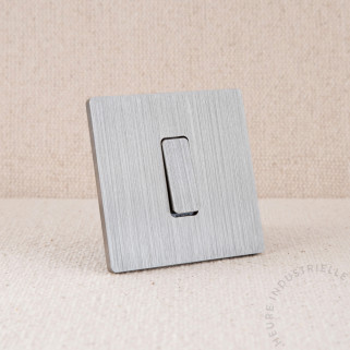 Interrupteur simple Modelec M nickel brossé touche noire