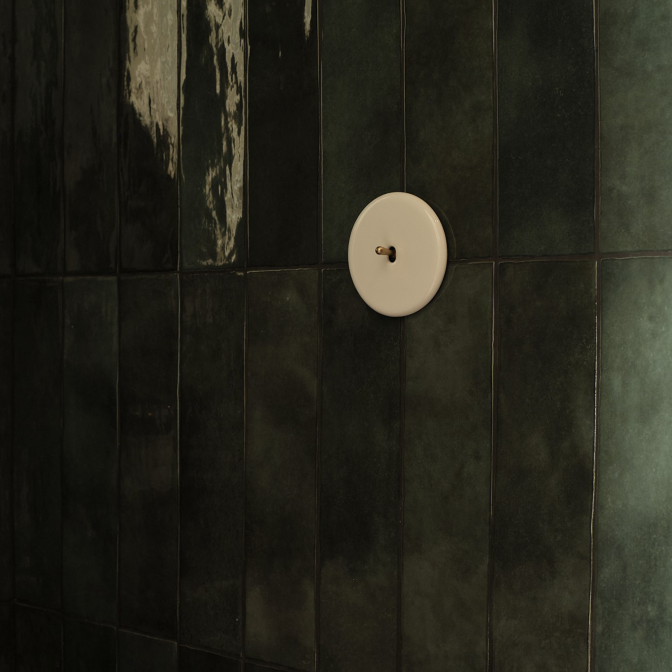 Interrupteur Iris Porcelaine blanche - doré - salle de bain